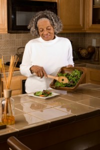 Woman making salad 